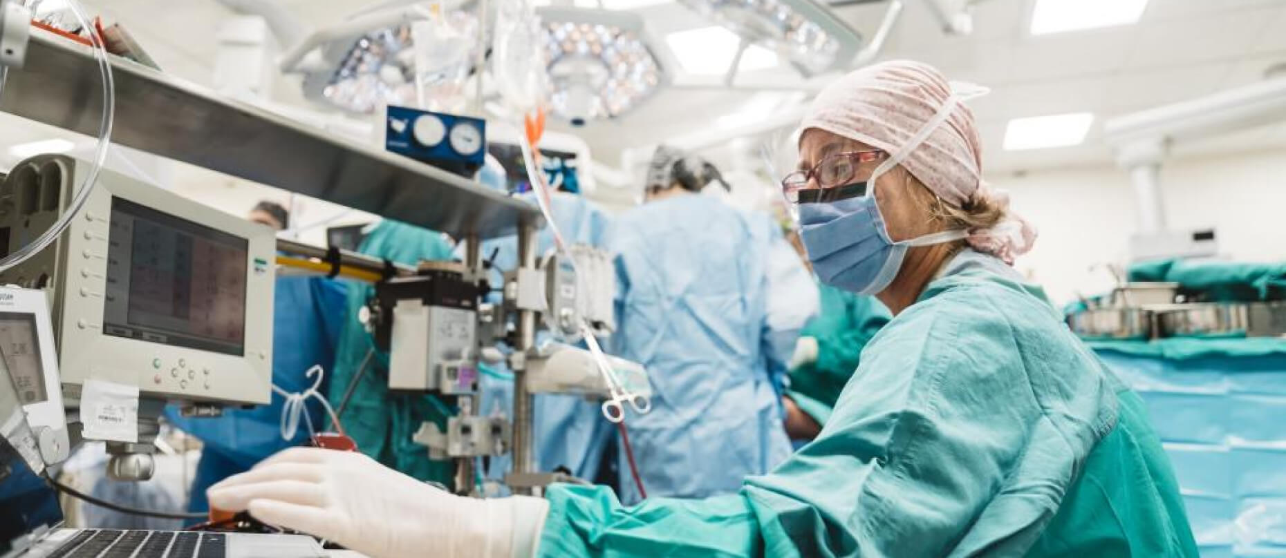 Cardiac care team performing a procedure in the electrophysiology lab